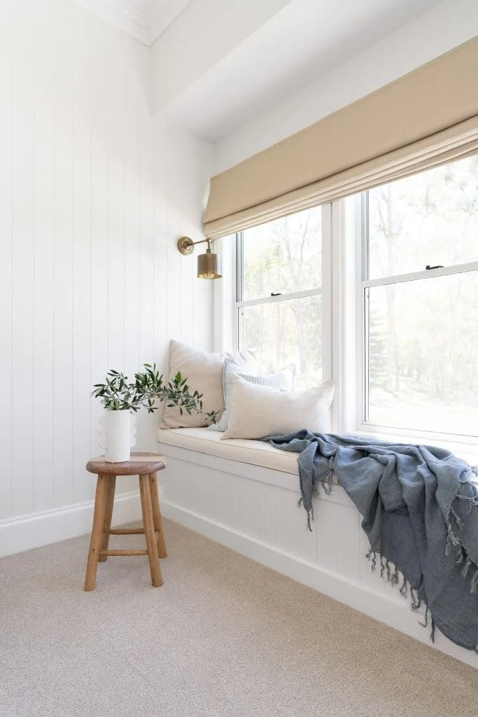 Modern minimalist space with natural textures, crisp finishes, and Intrim SK1006 skirting and architraves for a polished design.