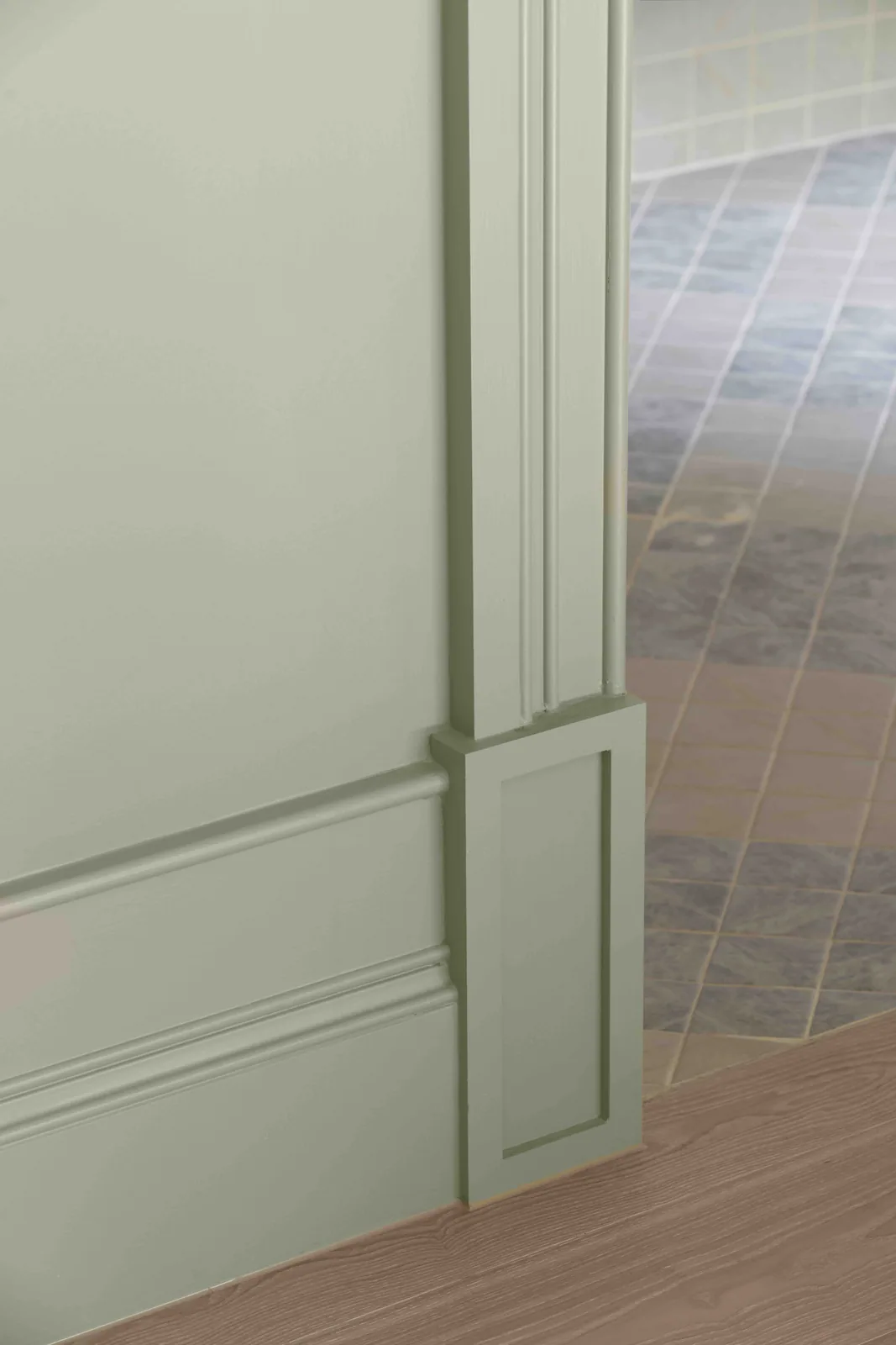 Timber skirting block moulding detail connecting architrave and skirting in a refined wall design