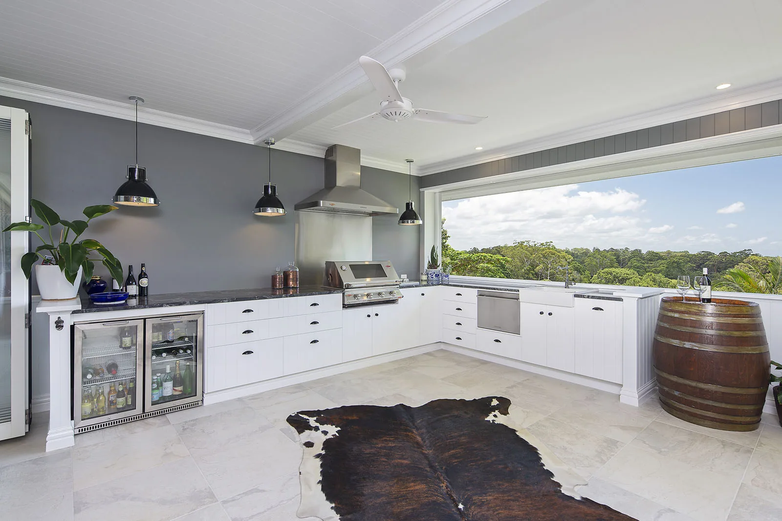 Spacious kitchen with decorative white timber cornice running along the ceiling perimeter.