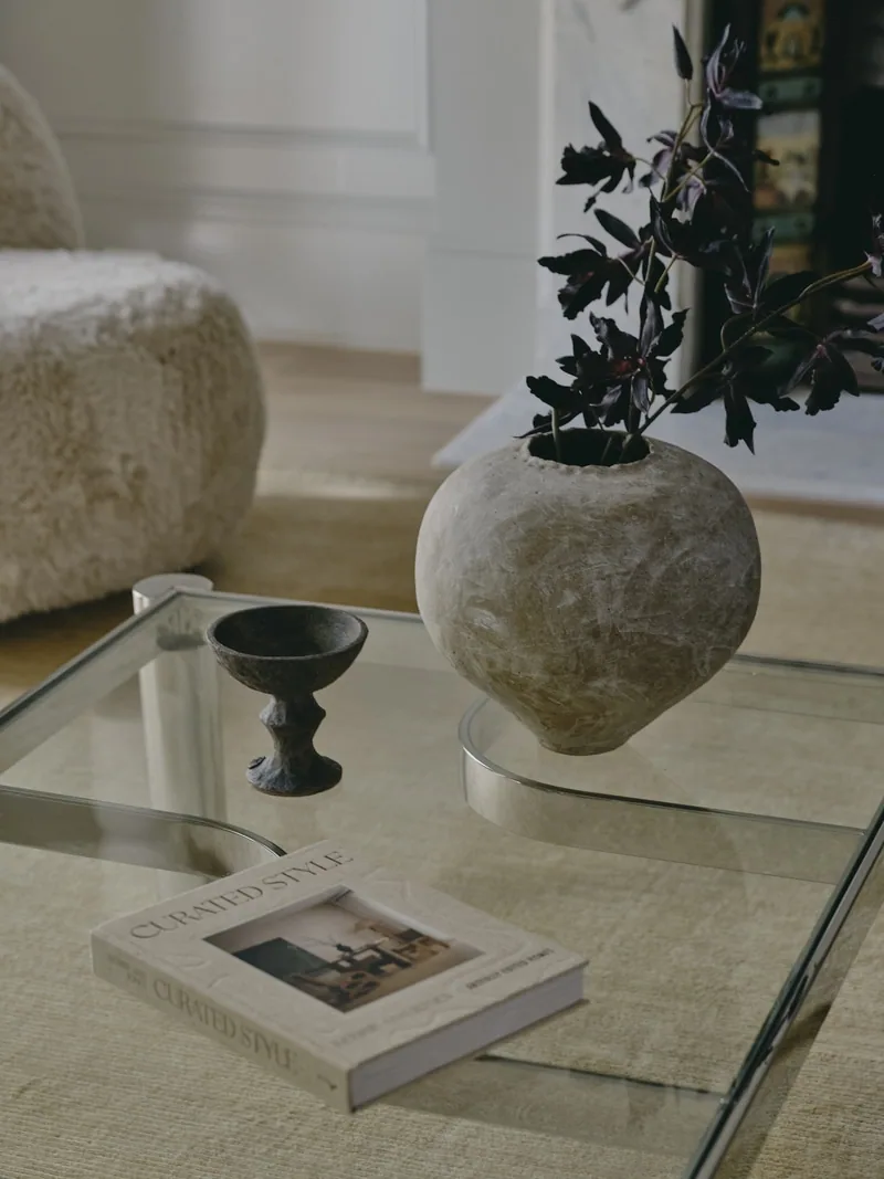Living room styling with coffee table and decorative vessel in Potts Point terrace renovation featuring Intrim wall panelling and skirting in the background