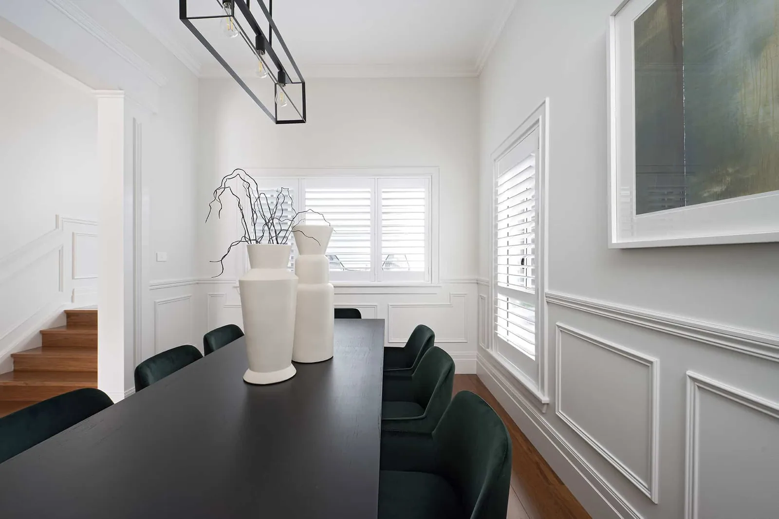 Modern Hamptons dining room featuring SK433 skirting and architrave profile with classic wall panelling and crisp architectural detailing